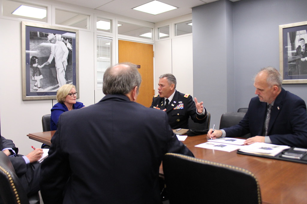 Satisfied customer and contractor after successful home service project